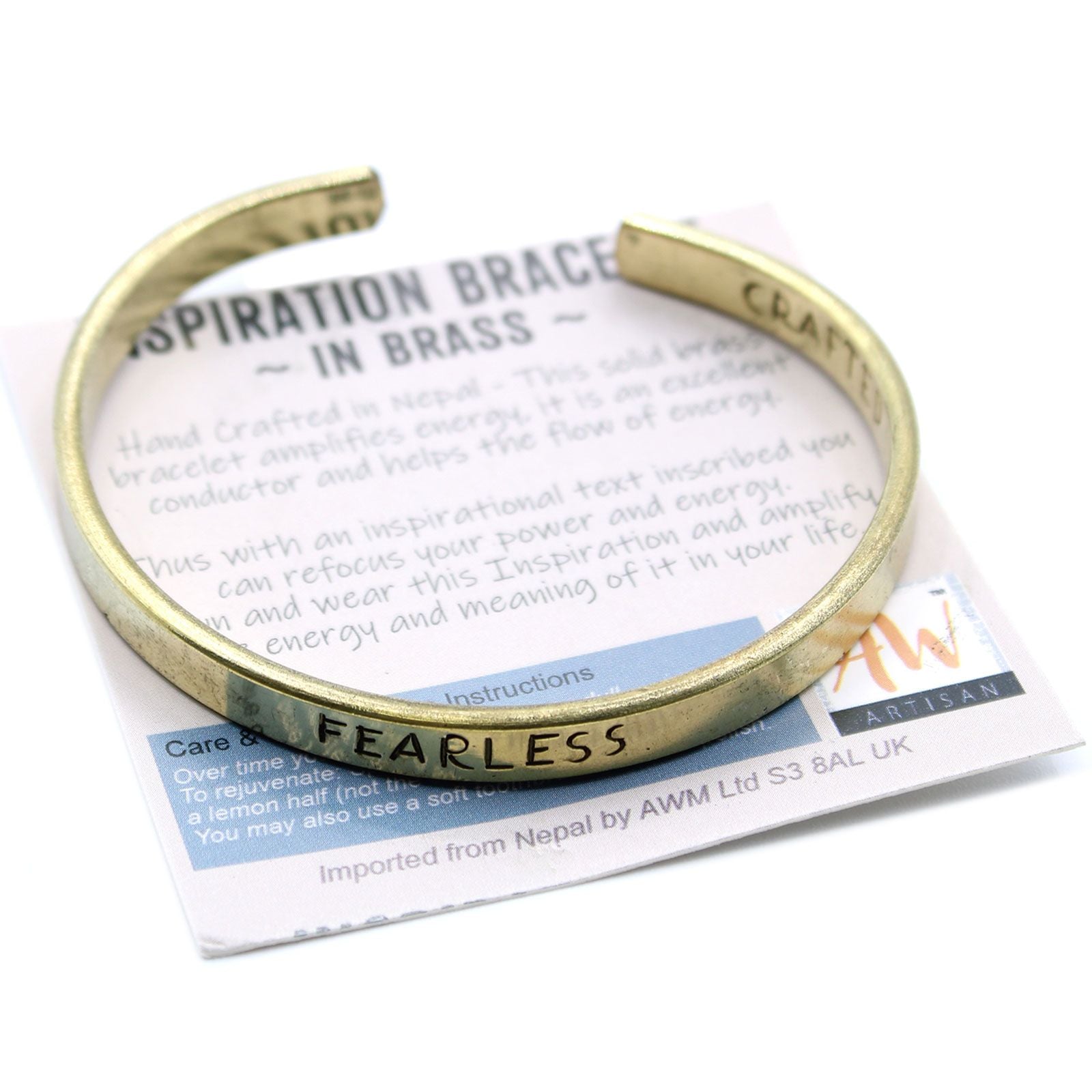 Brass bracelet with 'Fearless' engraving on a product card