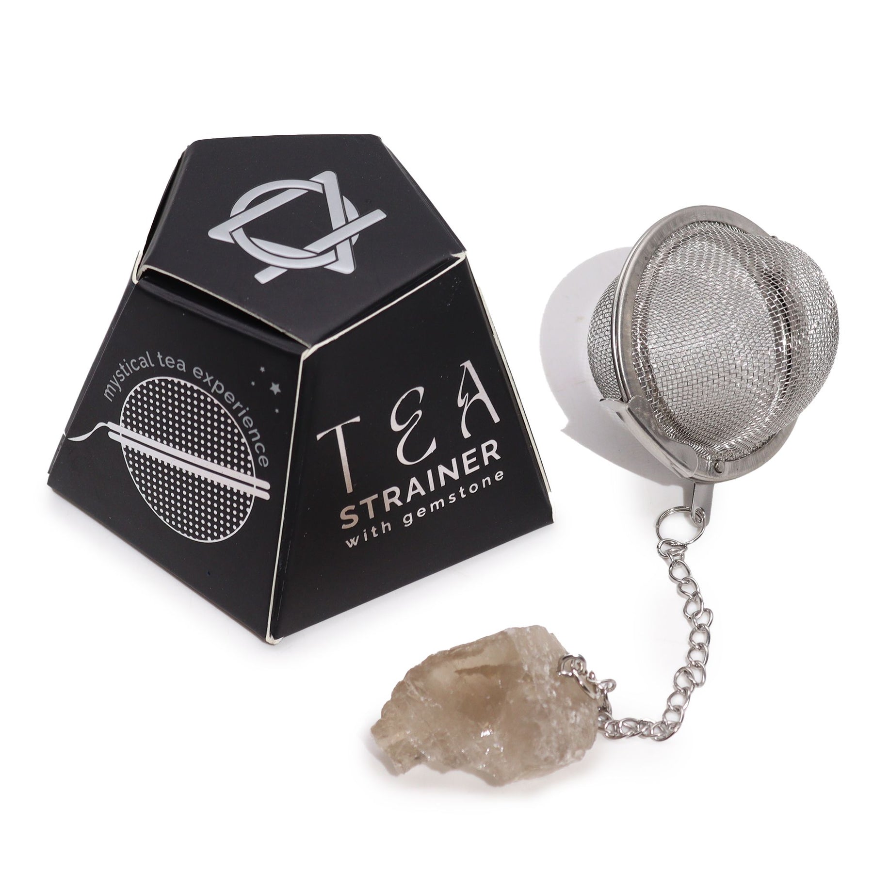 Tea strainer with gemstone and packaging on a white background