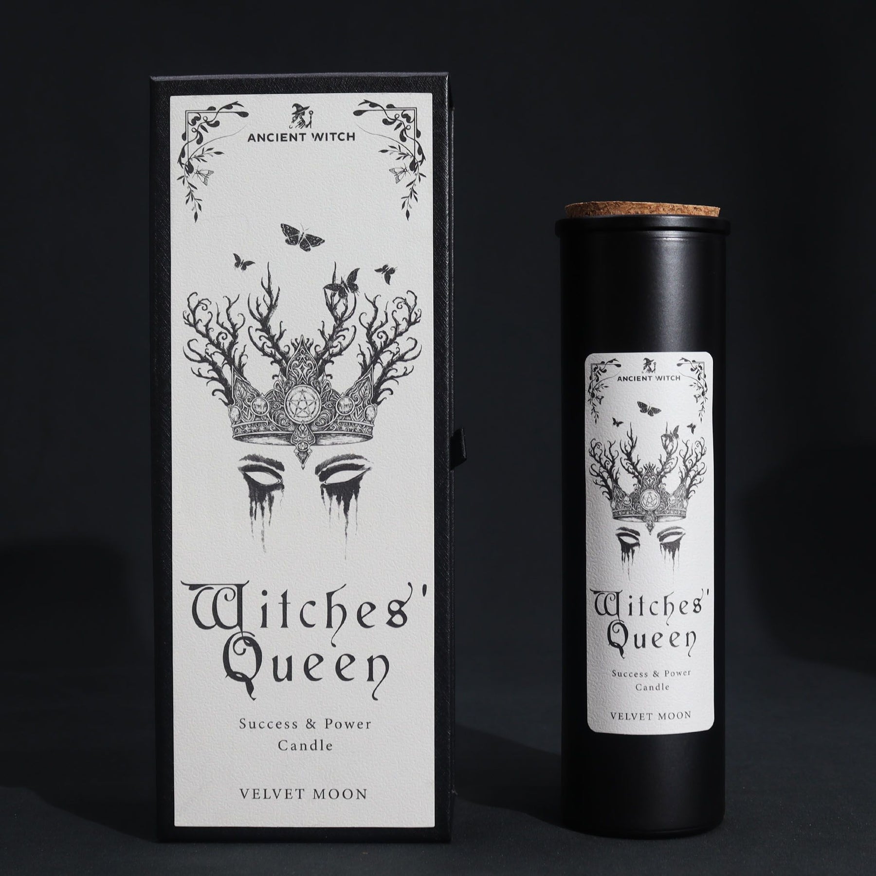 Witches' Queen candle packaging with black and white design on a dark background