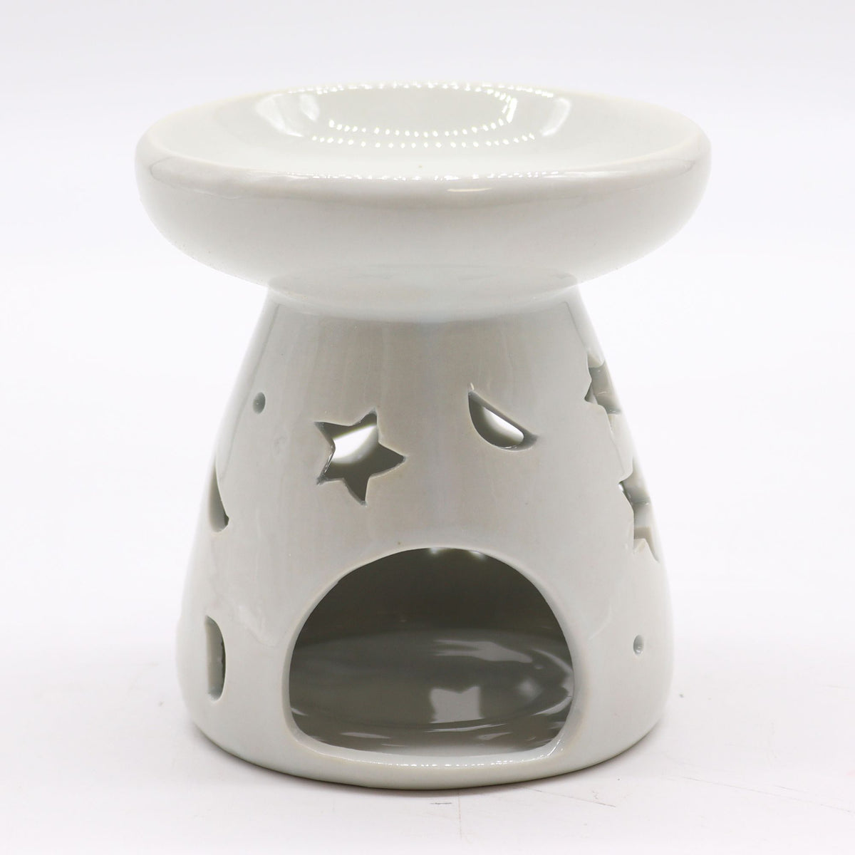 Large white ceramic oil burner with star and moon designs