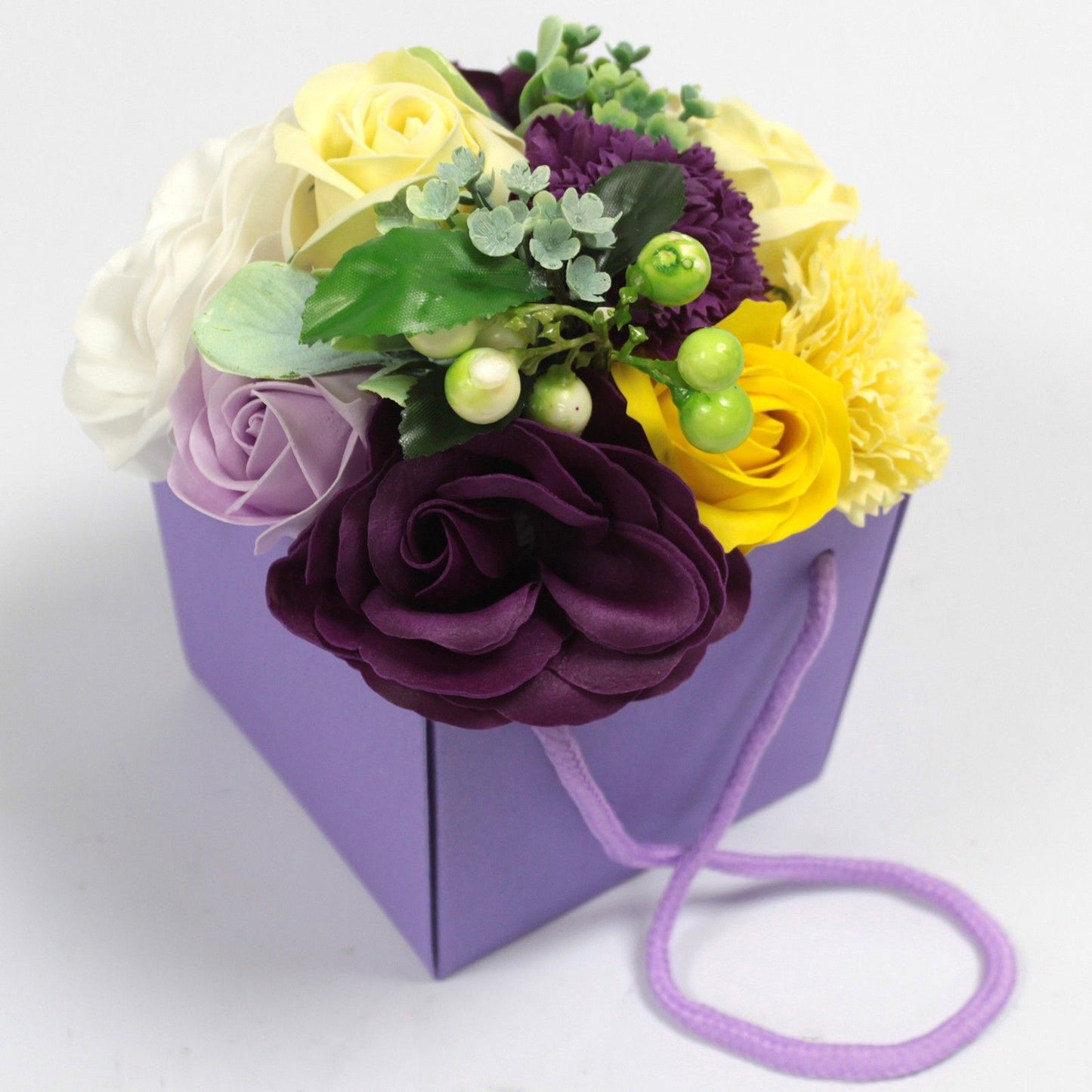 Purple Flower Garden soap flower bouquet with lifelike purple roses, lavender, hydrangeas and delicate blooms artistically arranged in elegant gift packaging with ribbon, presented as luxury bath gift