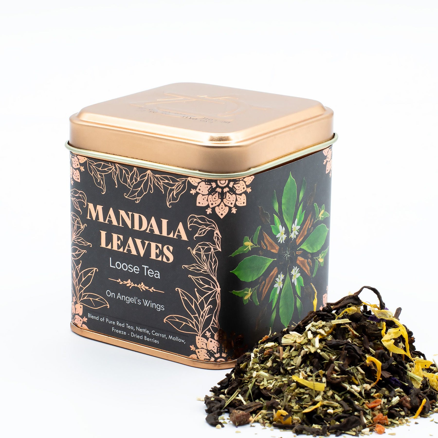 Tea canister labeled 'Mandala Leaves Loose Tea' with tea leaves spilling out on a white background
