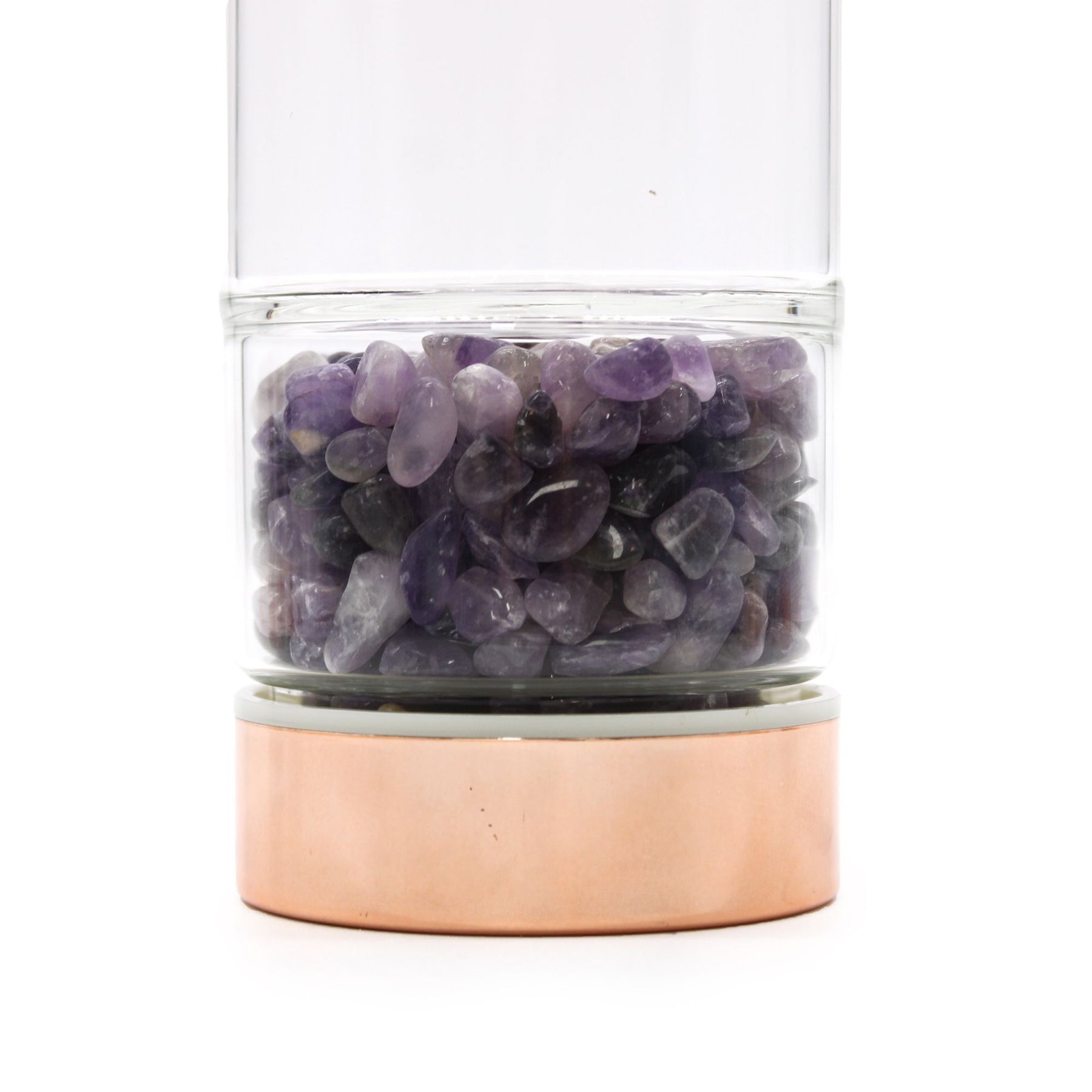 Rose gold amethyst crystal tea infuser bottle with removable bottom chamber full of purple amethyst chips, neoprene sleeve, loose leaf tea and steaming brew