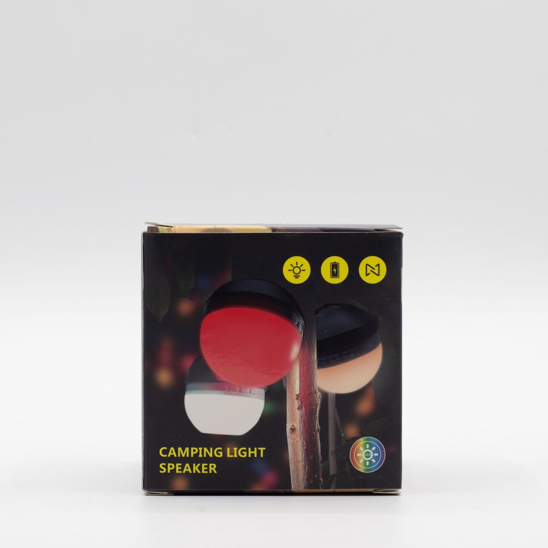 Green Camping Hanging Light & Mini Speaker hanging from tent ceiling with soft LED glow and Bluetooth music playing, compact cube design with carry loop visible