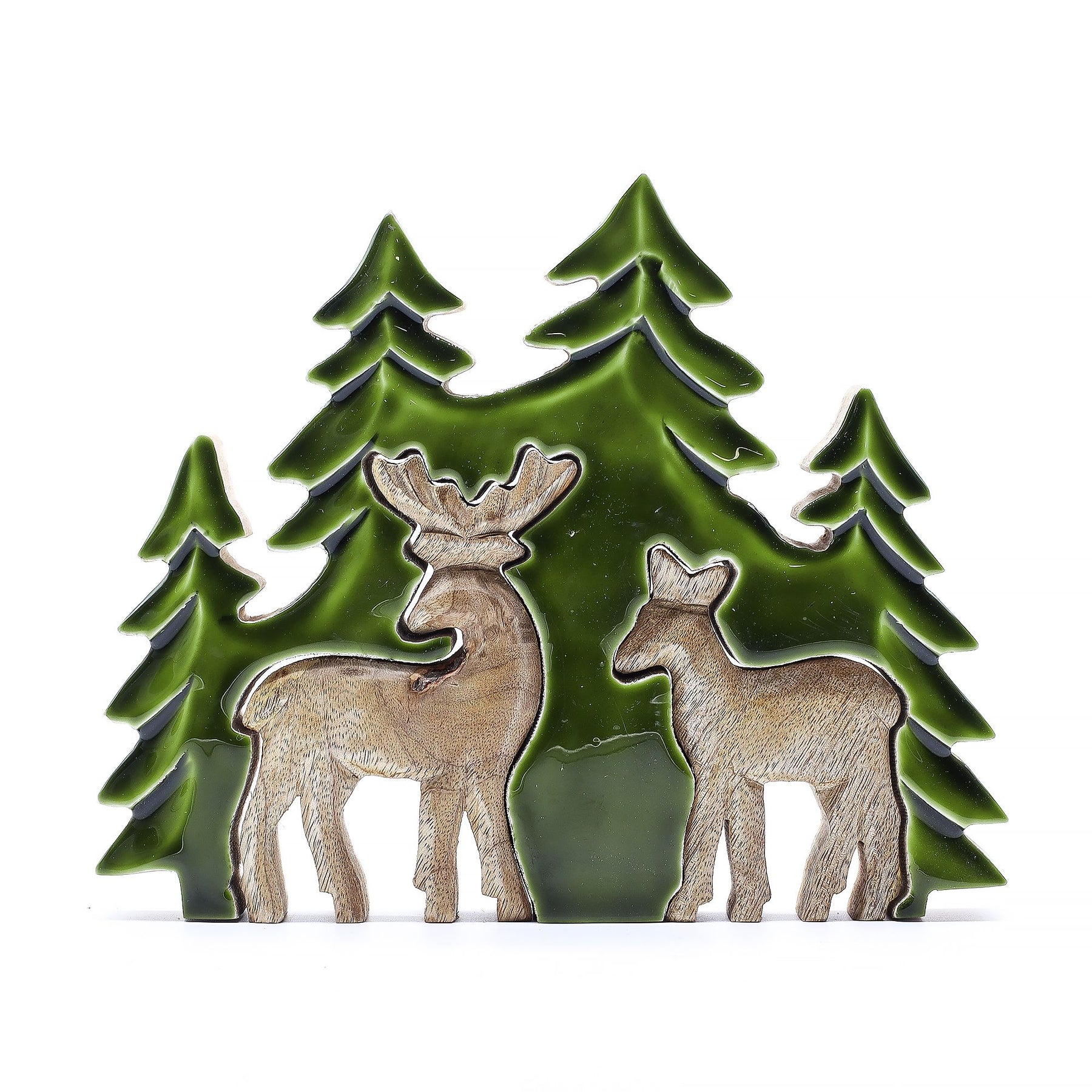 3D mango wood deer in forest decoration with two standing deer, green enamel trees and layered woodland scene on mantel with fairy lights and pine cones