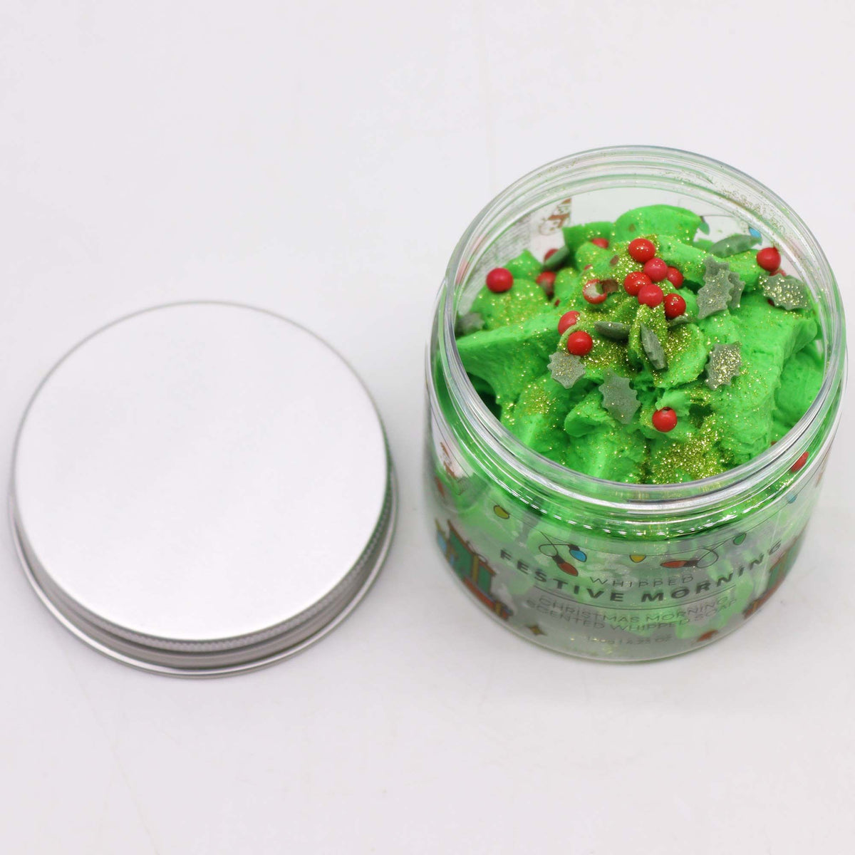 Festive Morning Whipped Soap 120g jar with delicate sugar Christmas trees and sparkling glitter on snowy winter background