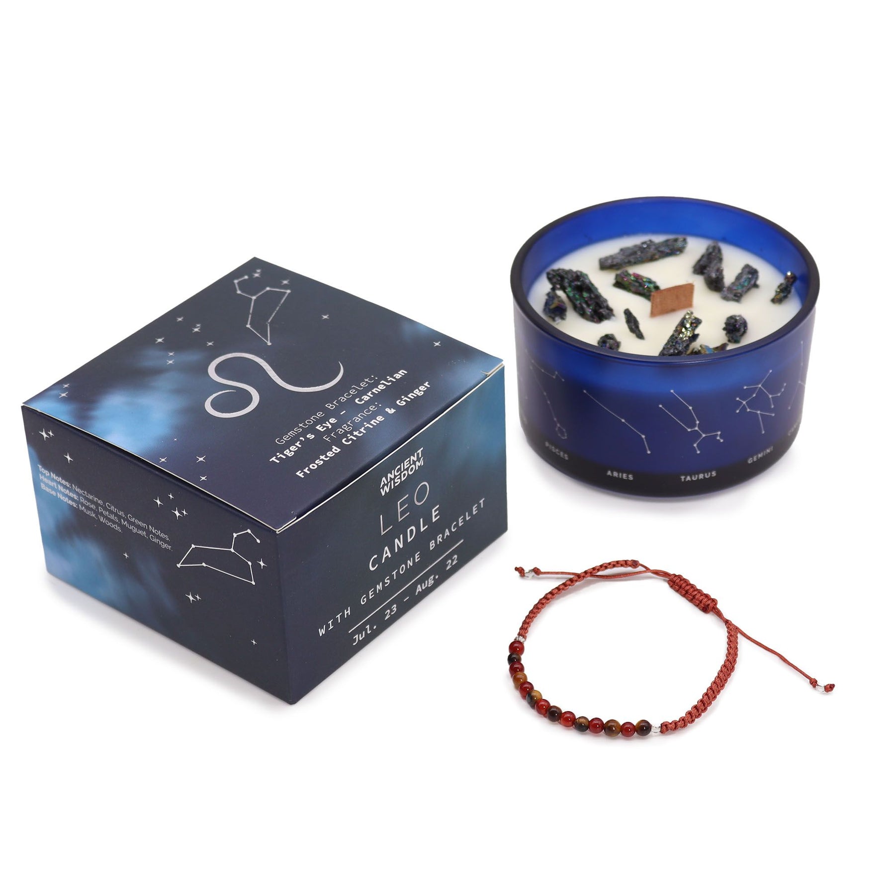Leo candle with constellation design and bracelet on a white background