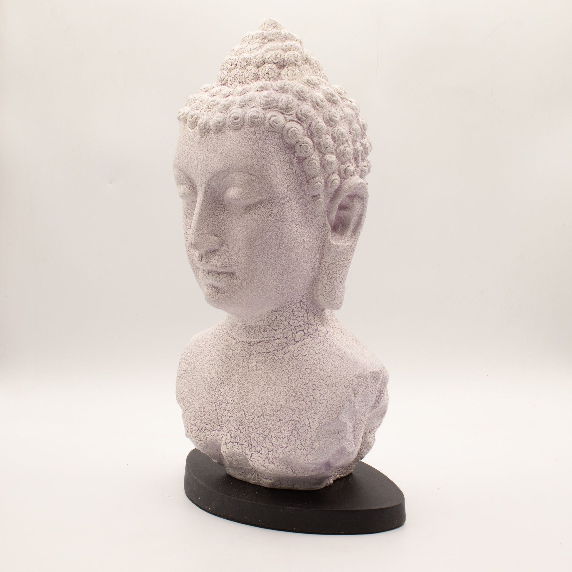 Buddha Bust Lamp with crackle textured surface on modern oval stand