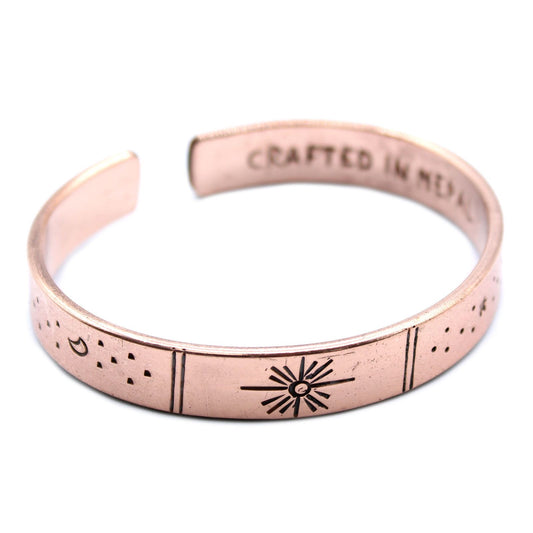 Hand-hammered brass galaxy cuff from Nepal with secret inner mantra (Dream Big, Reach For The Stars & more). Stars & Earth design outside. Fair-trade, adjustable, gift-ready with story card