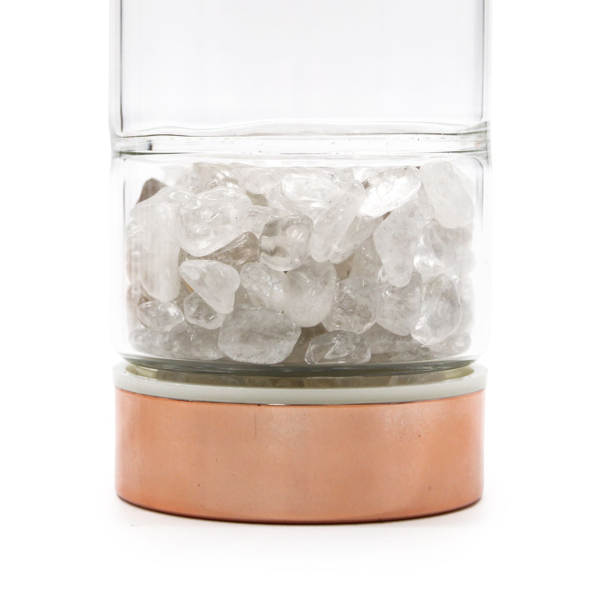 Rose gold rock quartz crystal tea infuser bottle with removable bottom chamber full of clear quartz points, neoprene sleeve