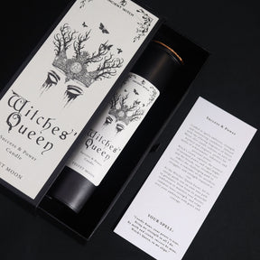 Witches' Queen candle packaging with decorative design and information sheet on a black background