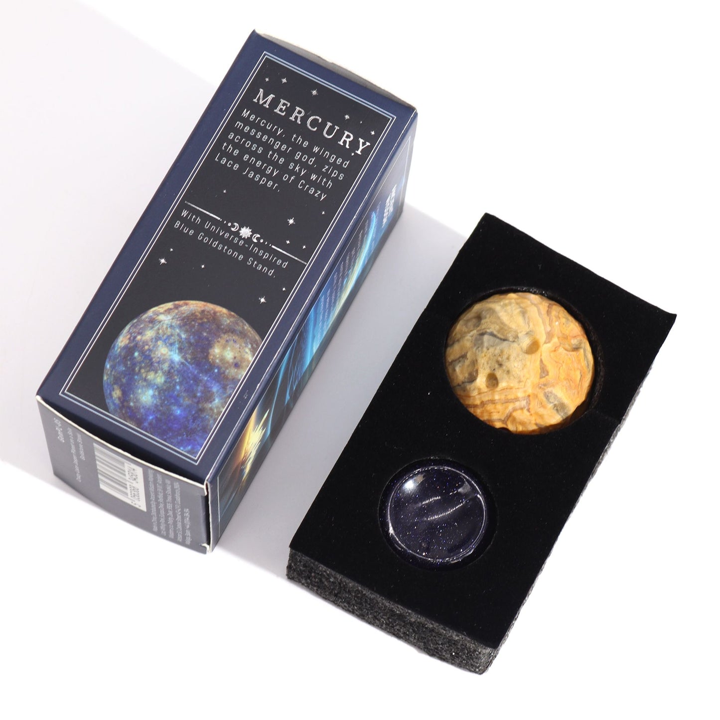 40mm swirling Crazy Lace Jasper Mercury sphere floating on shimmering goldstone ring stand, glowing against starry cosmic background