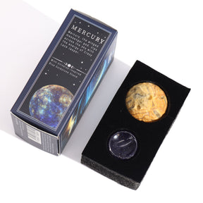 40mm swirling Crazy Lace Jasper Mercury sphere floating on shimmering goldstone ring stand, glowing against starry cosmic background