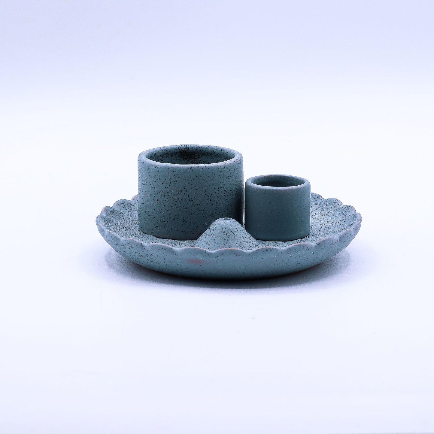 Ceramic candle holder with two cups on a matching base