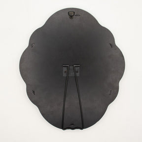 Detail of built-in rear stand for tabletop use, sturdy MDF construction visible