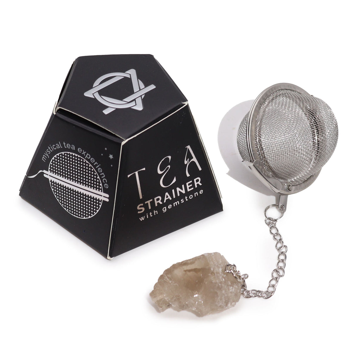 Tea strainer with gemstone and packaging on a white background
