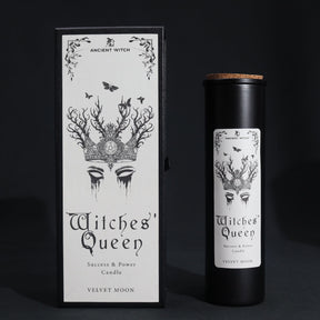 Witches' Queen candle packaging with black and white design on a dark background