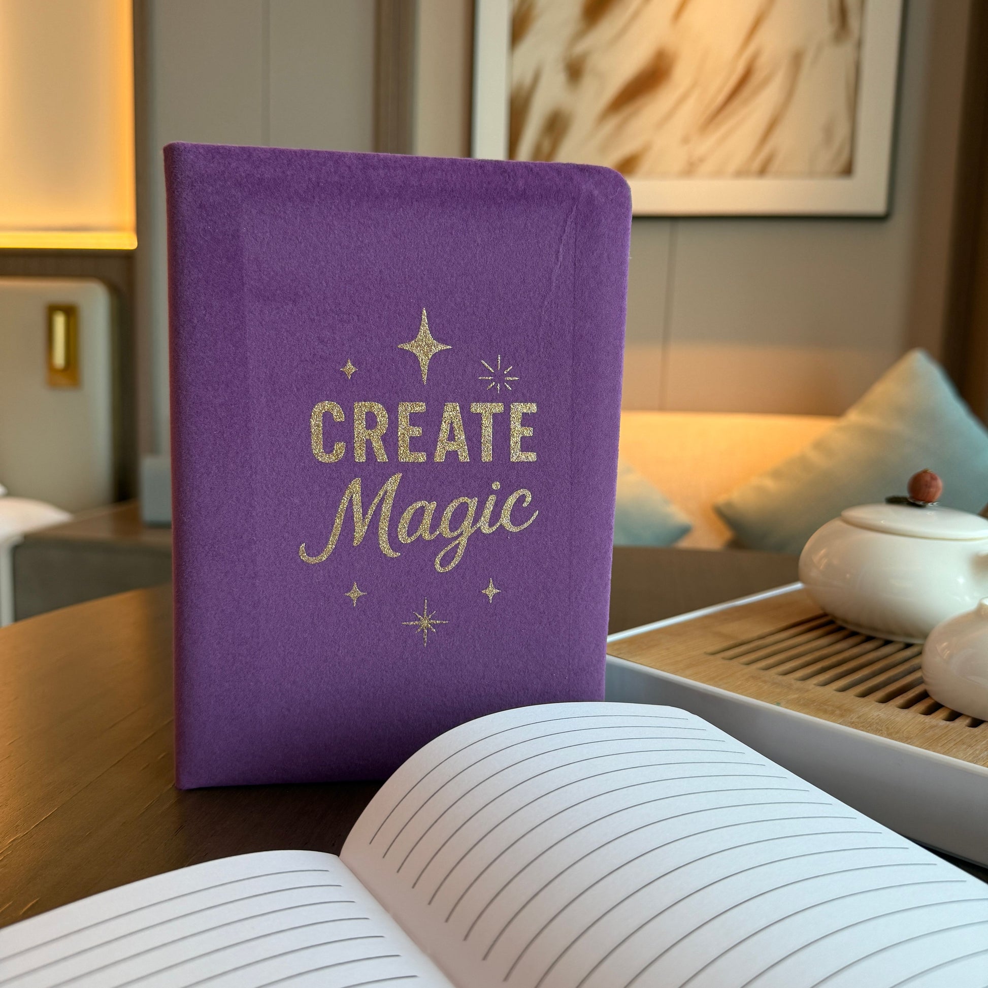 Deep purple velvet notebook with rose-gold “Create Magic” foil embossing