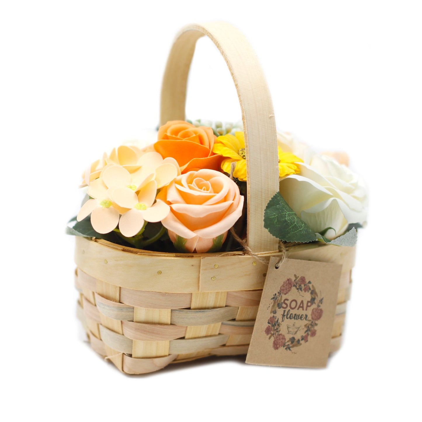 Medium orange soap flower bouquet with lifelike roses and blooms beautifully arranged in natural wicker basket, tied with ribbon, presented as luxury bath gift on soft white background