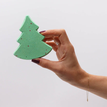 Gingerbread Town Christmas bath bomb gift pack with green tree and iced gingerbread house bath bombs in festive kraft box with red ribbon