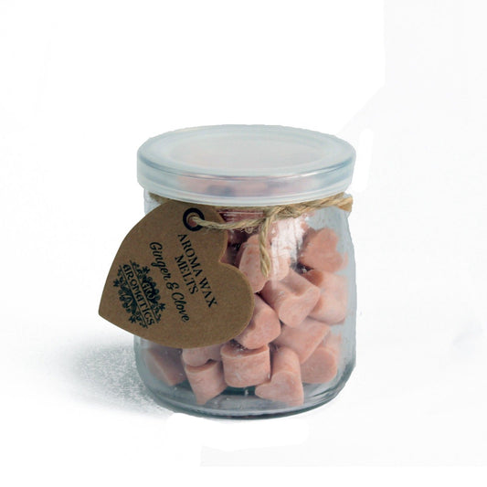 Glass jar of Ginger & Clove Aroma Wax Melts with heart-shaped soy wax pieces