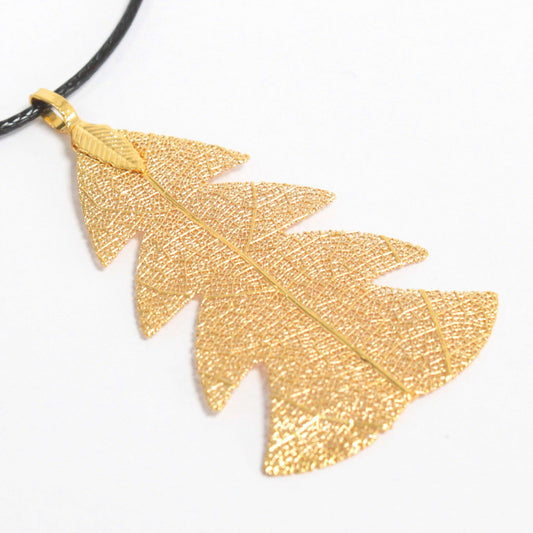 Gold electroplated real festive fir leaf necklace pendant on delicate chain, natural leaf veins visible
