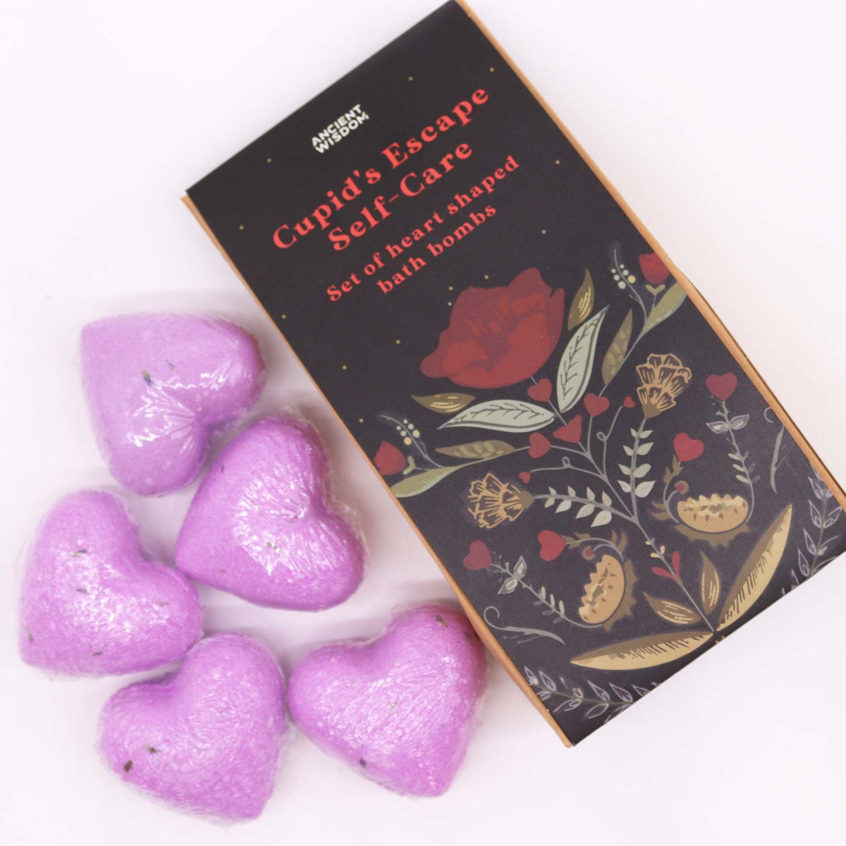 Cupids Escape Bath Heart Gift Set in elegant lavender-themed box with 5 pale purple heart-shaped bath bombs