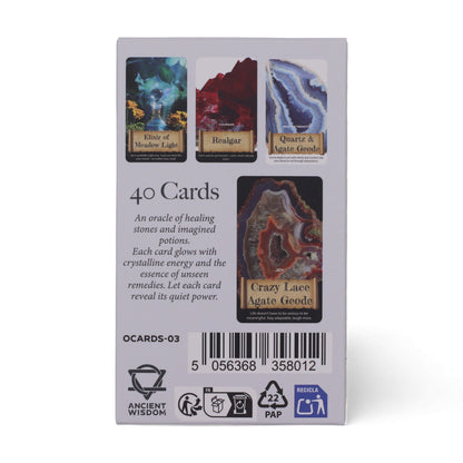 Crystals & Elixirs Oracle Deck fanned out showing colourful gemstone illustrations & elixir messages, box with radiant crystal design