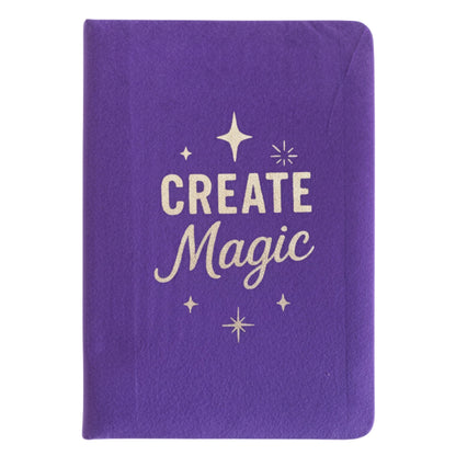 Deep purple velvet notebook with rose-gold “Create Magic” foil embossing