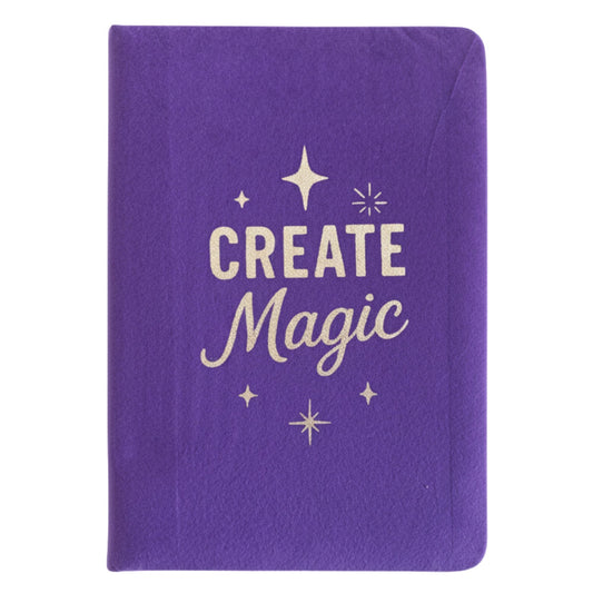 Deep purple velvet notebook with rose-gold “Create Magic” foil embossing