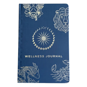 Deep midnight blue wellness journal with silver foil zodiac constellations, open to colourful mood wheel page