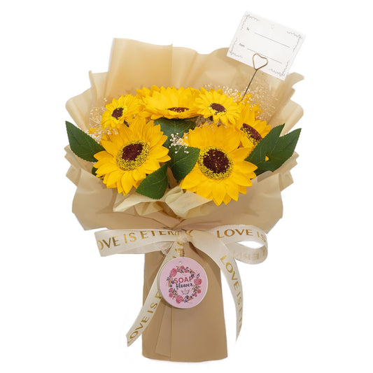 Large vibrant sunflower bouquet crafted from soap petals in golden wrapping with "Love is Eternal" ribbon