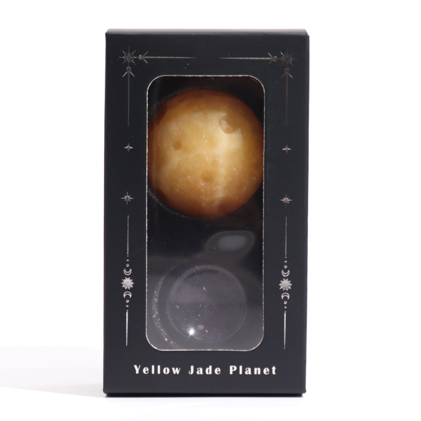40mm yellow jade Saturn sphere floating on shimmering goldstone ring stand, glowing against starry black background with subtle cosmic light