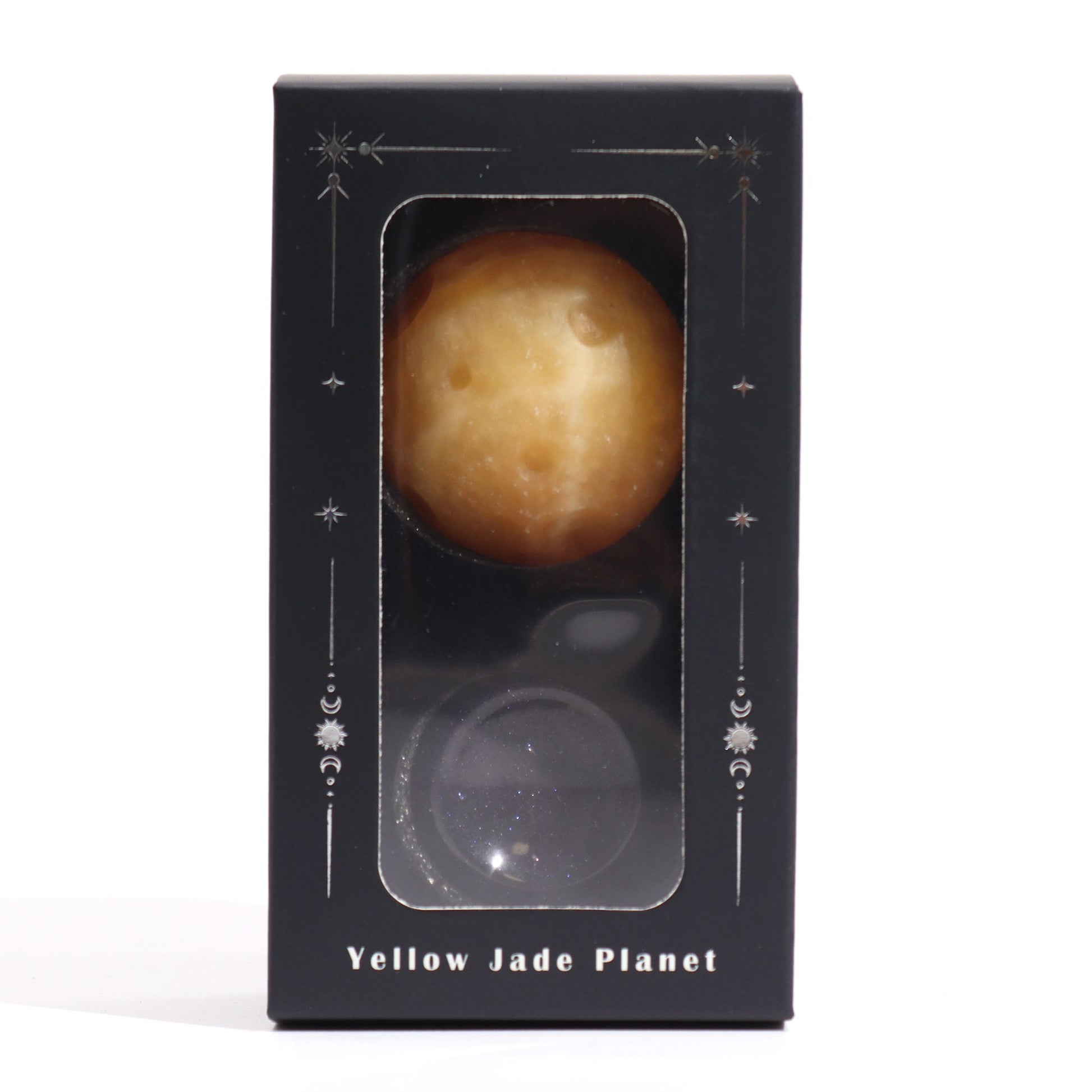 40mm yellow jade Saturn sphere floating on shimmering goldstone ring stand, glowing against starry black background with subtle cosmic light