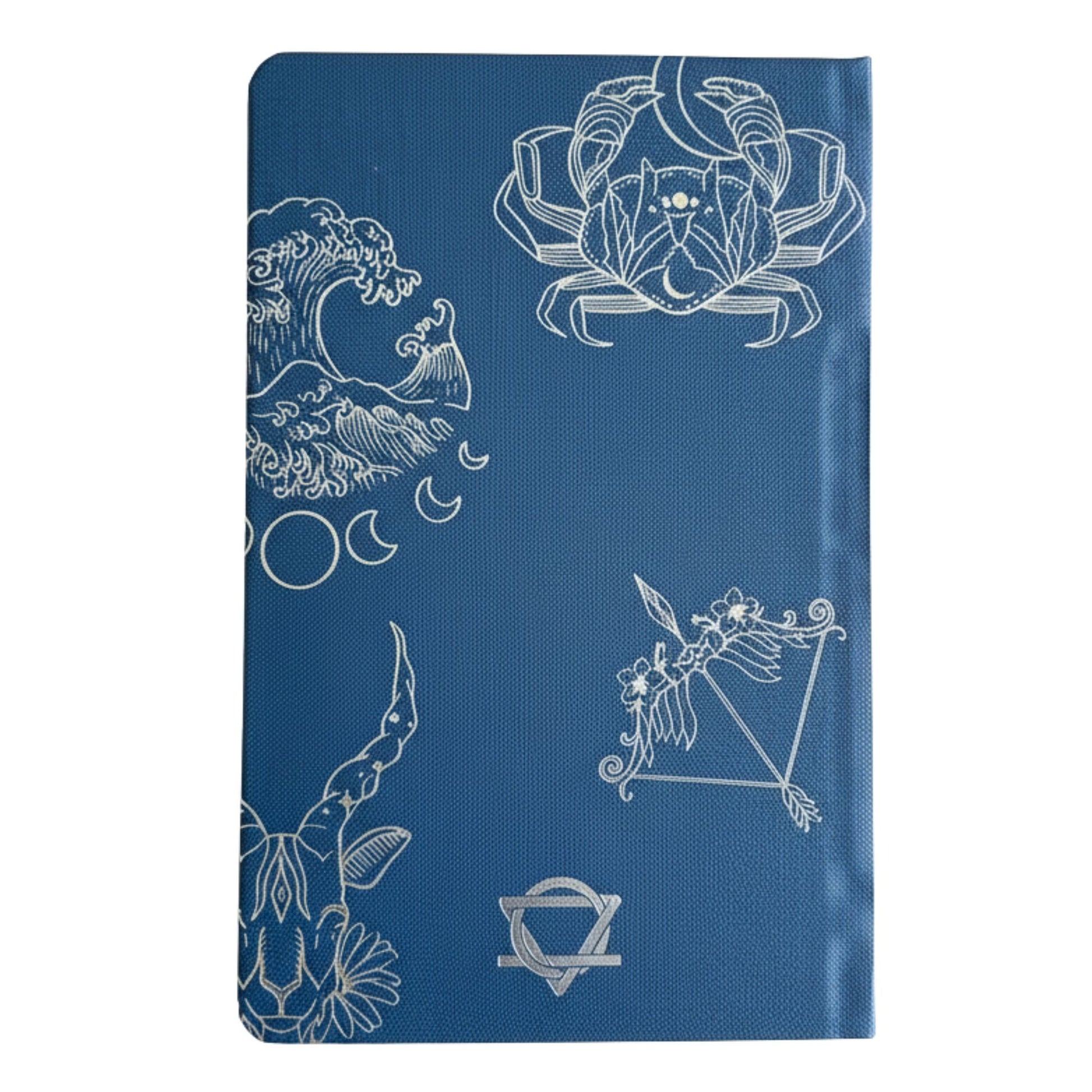 Deep midnight blue wellness journal with silver foil zodiac constellations, open to colourful mood wheel page