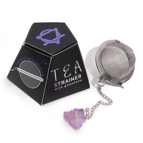 Tea strainer with gemstone and packaging on a white background