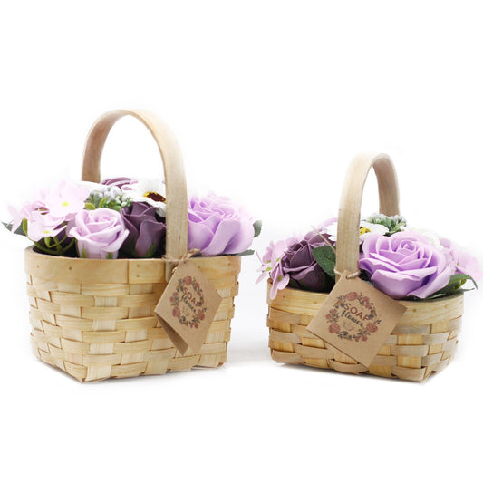 Two woven baskets with soap flowers on a white background