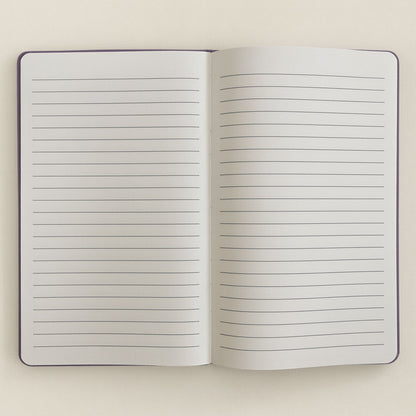 Deep purple velvet notebook with rose-gold “Create Magic” foil embossing