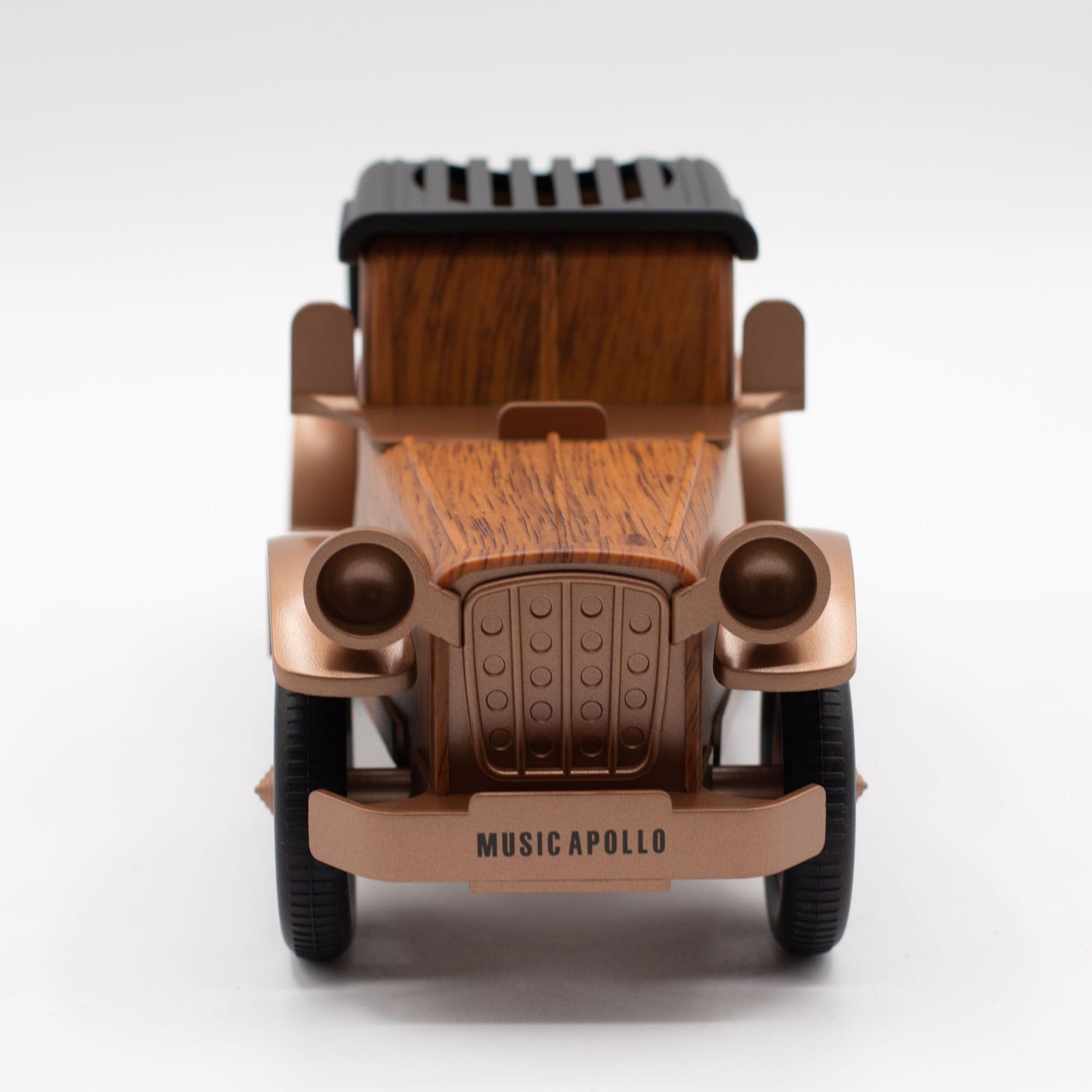 Wooden car speaker with copper accents and 'Music Apollo' branding