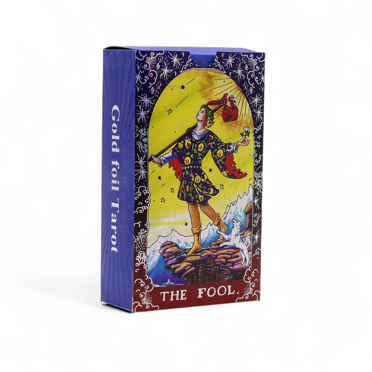 Blue foil Mandala Tarot Deck fanned out showing intricate gold mandala designs on deep blue cards, guidebook and box