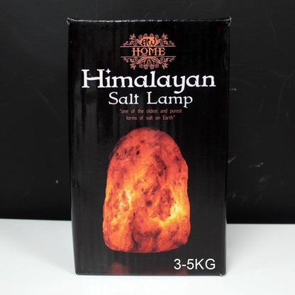 Large 3–5kg natural pink Himalayan salt lamp glowing richly on wooden base