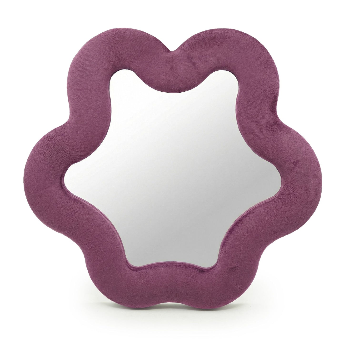 Soft squiggly star mirror in muted mauve velvet frame with gentle wavy edges