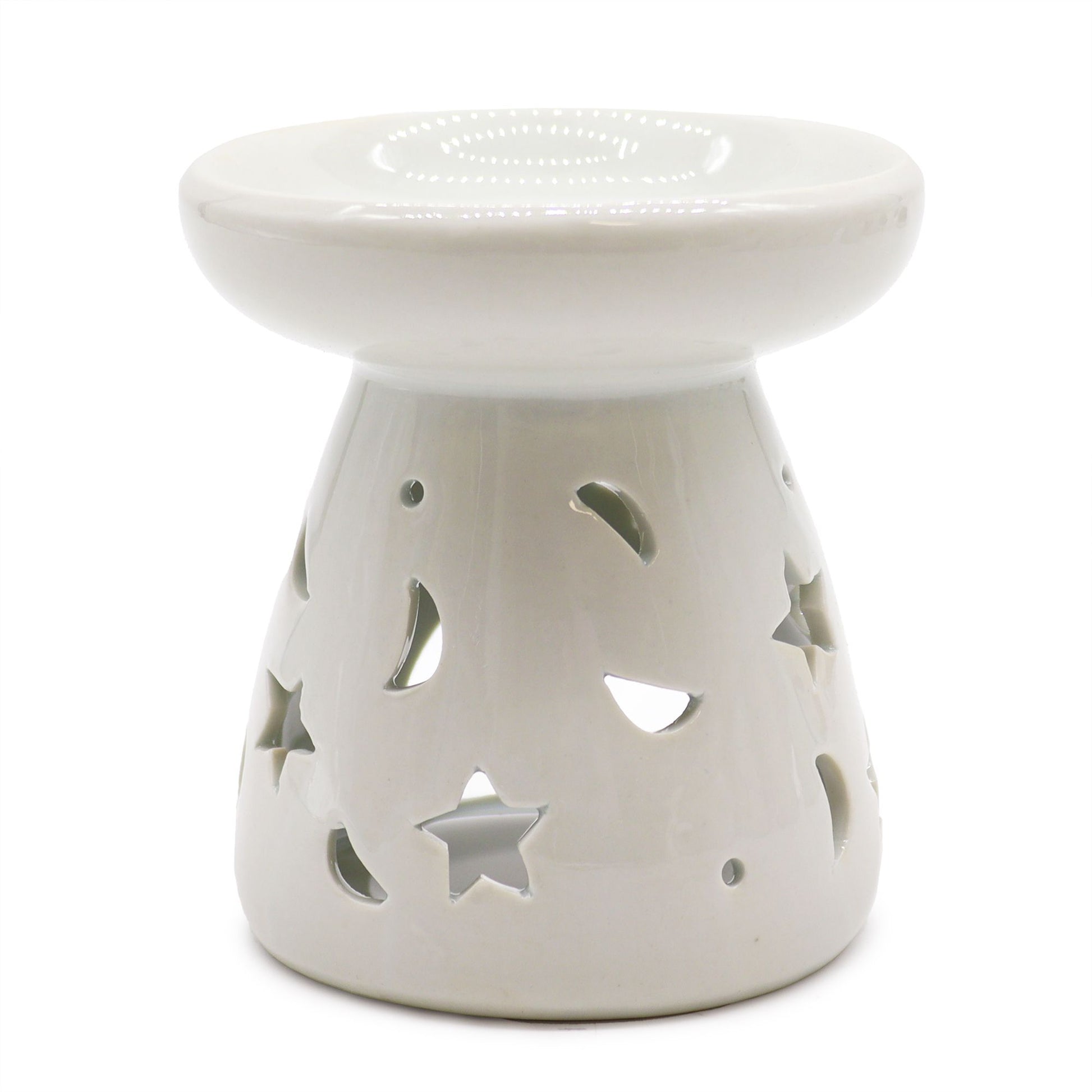 White ceramic oil burner with star and moon cutouts