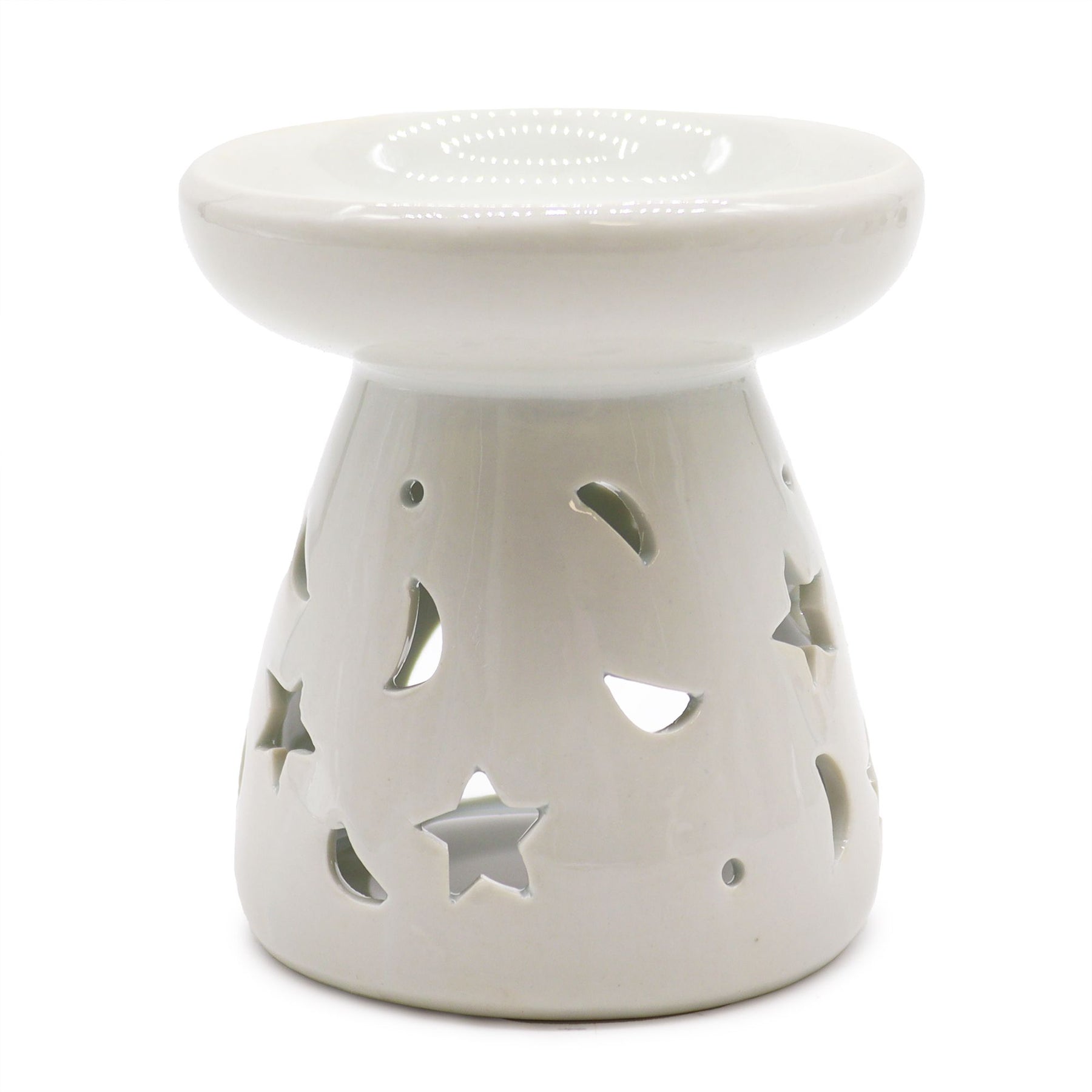 White ceramic oil burner with star and moon cutouts