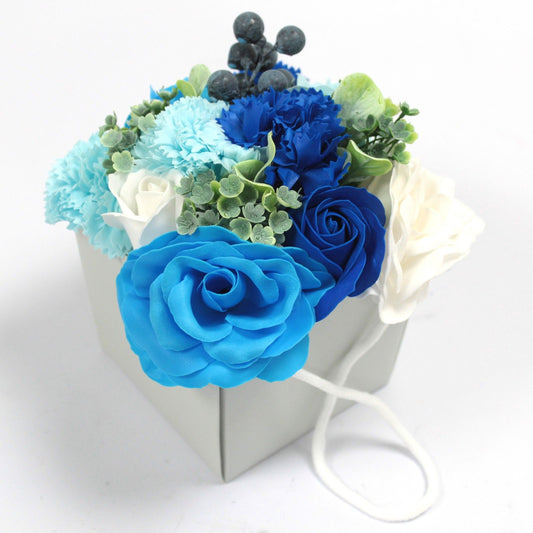 Blue Wedding soap flower bouquet with lifelike pale blue roses, hydrangeas and delicate blooms artistically arranged in elegant gift packaging with satin ribbon, presented as luxury bath gift