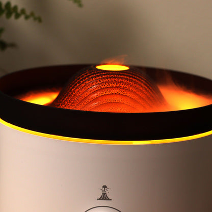 Large black volcano aroma diffuser erupting with swirling coloured mist and glowing LED ring