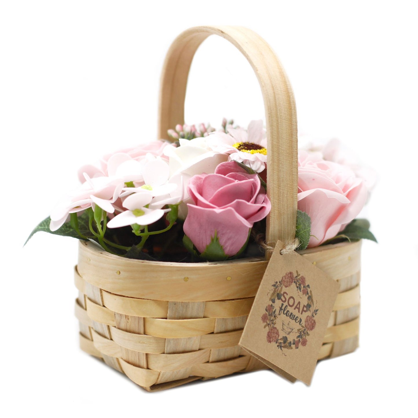 Medium pink soap flower bouquet with lifelike roses and blooms beautifully arranged in natural wicker basket, tied with ribbon, presented as luxury bath gift on soft white background