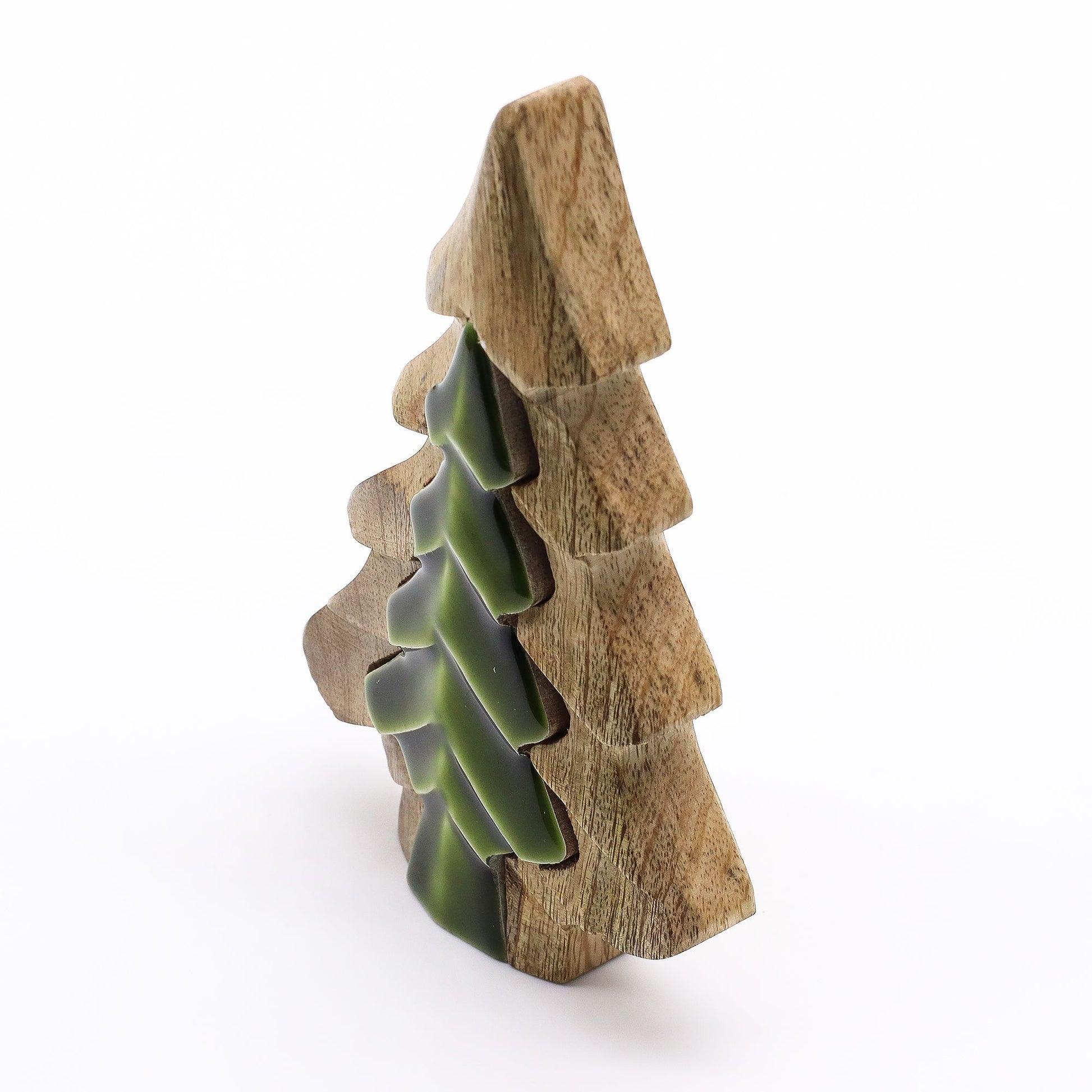 Wooden and green ceramic Christmas tree ornament on a white background