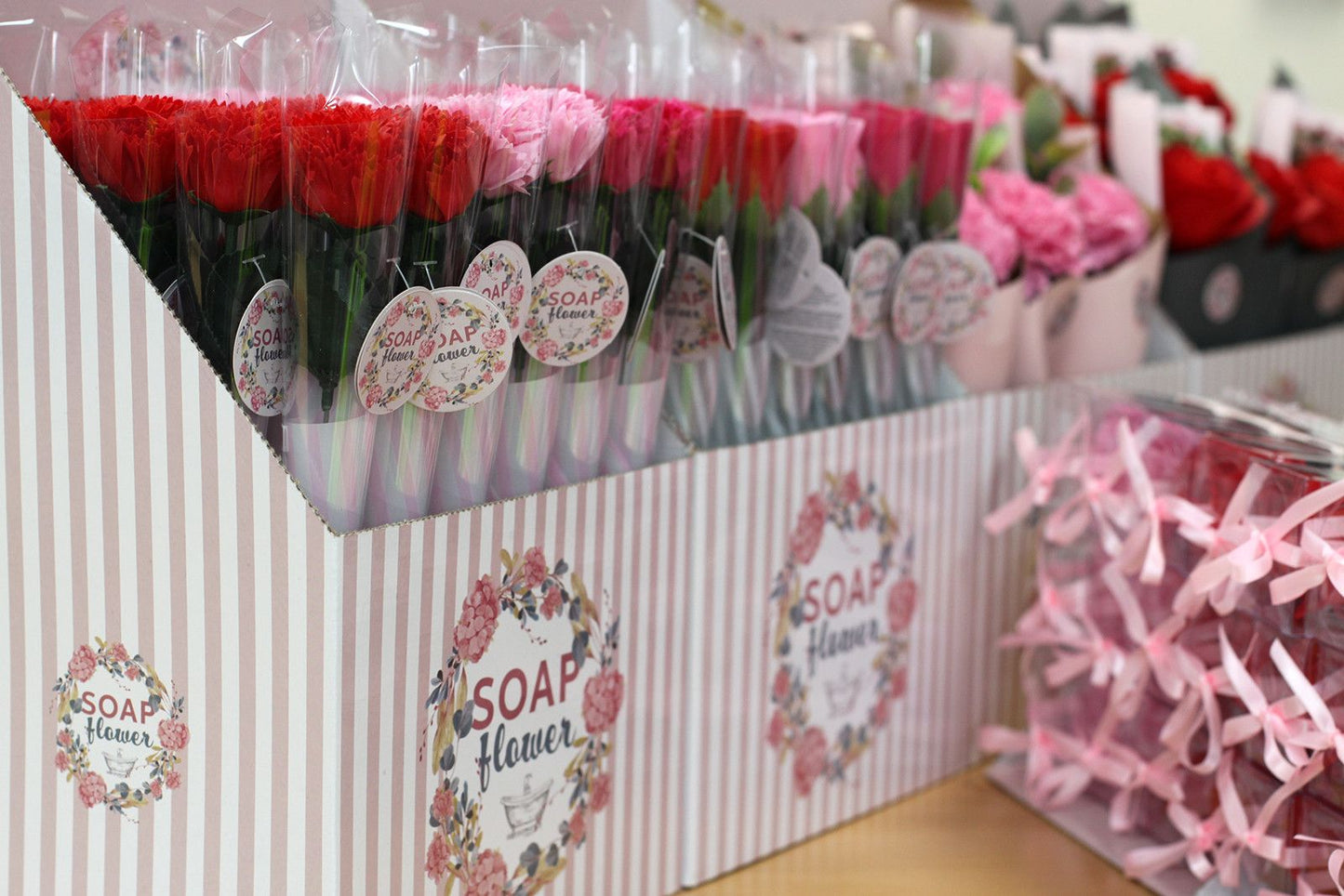Display of soap flowers in packaging