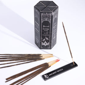Incense sticks with a hexagonal box labeled 'Success' and incense holder on a white background